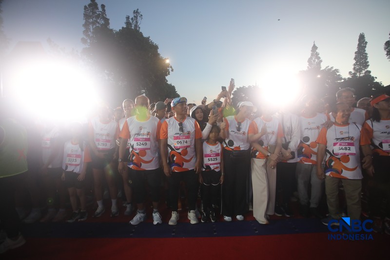Peserta Jogja Run D-City (JRDC) 2026 yang menjadi bagian dari Jogja Financial Festival di Universitas Gadjah Mada, Yogyakarta, Minggu (24/5/2026) pagi. (CNBC Indonesia/Faisal Rahman)