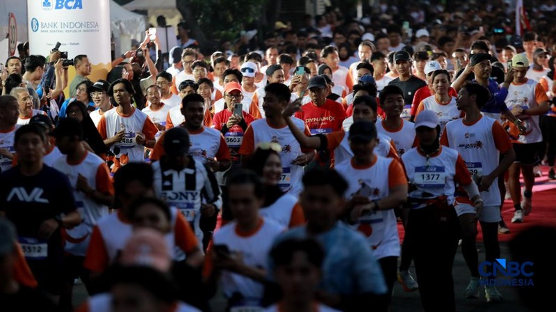 Peserta Jogja Run D-City (JRDC) 2026 yang menjadi bagian dari Jogja Financial Festival di Universitas Gadjah Mada, Yogyakarta, Minggu (24/5/2026) pagi. (CNBC Indonesia/Muhammad Sabki)