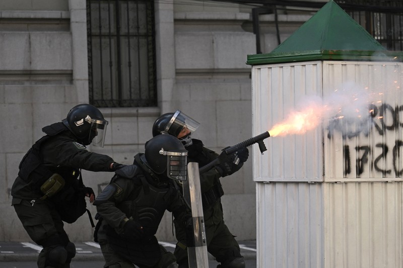 Security forces use tear gas during nationwide protests aiming to press Bolivian President Rodrigo Paz's government to roll back austerity measures and address rising costs of living, in Apacheta, Bolivia, May 23, 2026. REUTERS/Claudia Morales