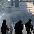 Police stand guard as they clash with demonstrators on the day of a march calling for the resignation of Bolivian President Rodrigo Paz, while the country’s economic and fuel crisis worsens due to a shortage of U.S. dollars and declining domestic e