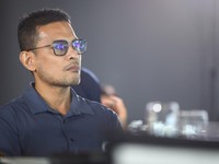 Tenaga Ahli Utama Badan Komunikasi Pemerintah (Bakom RI), Fithra Faisal Hastiadi saat menyampaikan pemaparan dalam Coffee Morning bertajuk Redefining Trade Rules : Fair Tariffs for Long-Term Sustainable Partnerships di Jakarta, Selasa (26/5/2026). (C