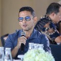 Tenaga Ahli Utama Badan Komunikasi Pemerintah (Bakom RI), Fithra Faisal Hastiadi saat menyampaikan pemaparan dalam Coffee Morning bertajuk Redefining Trade Rules : Fair Tariffs for Long-Term Sustainable Partnerships di Jakarta, Selasa (26/5/2026). (C
