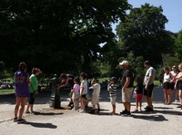 People queue to use a water fountain in Buttes Chaumont park, as temperatures reached up to 35 degrees Celsius, during a period of hot weather in Paris, France, May 25, 2026. REUTERS/Tom Nicholson