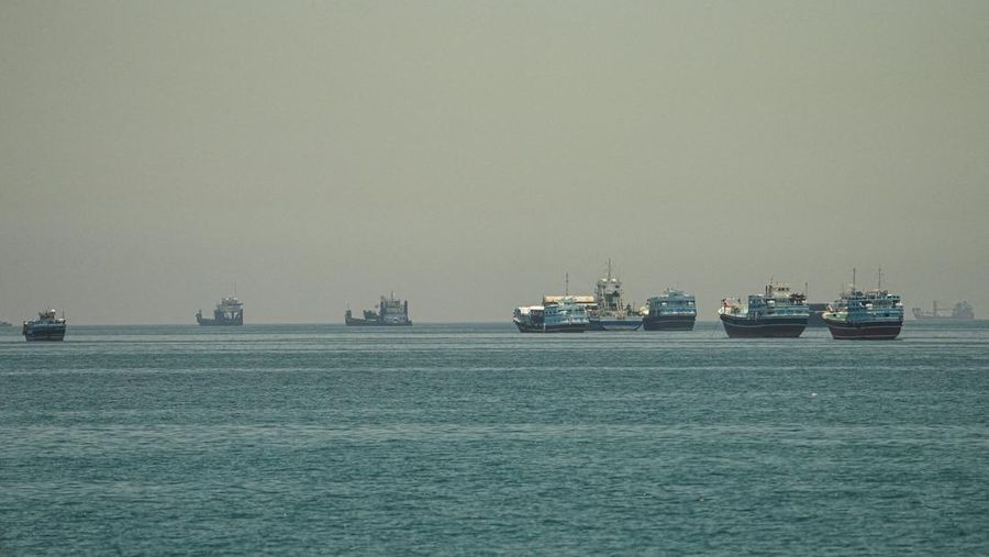 Vessels anchored at the Strait of Hormuz, as seen from Musandam, Oman, May 25, 2026. REUTERS/Stringer REFILE - CORRECTING INFORMATION FROM "VESSELS SAILING THROUGH THE STRAIT OF HORMUZ" TO "VESSELS ANCHORED AT THE STRAIT OF HORMUZ".