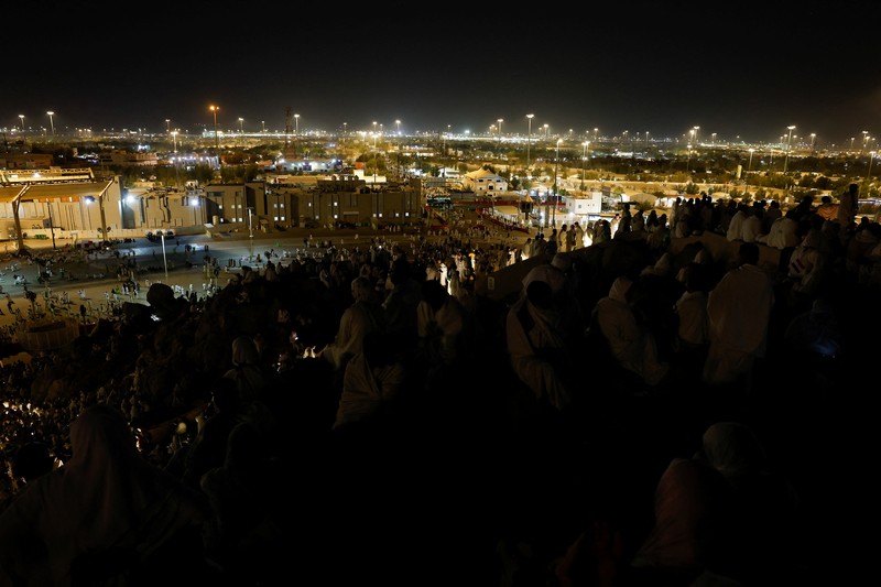 Muslim pilgrims gather at Mount of Mercy on the plain of Arafat during the annual hajj pilgrimage, outside the holy city of Mecca, Saudi Arabia, May 26, 2026. REUTERS/Ibraheem Abu Mustafa