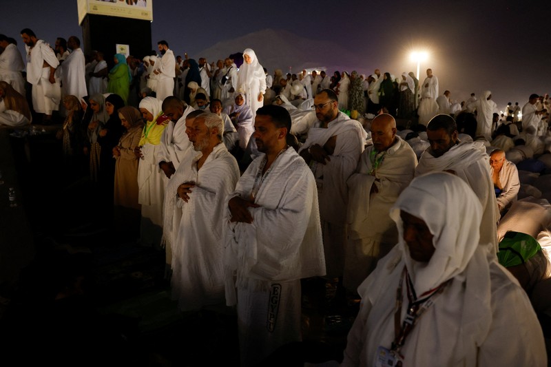 Muslim pilgrims gather at Mount of Mercy on the plain of Arafat during the annual hajj pilgrimage, outside the holy city of Mecca, Saudi Arabia, May 26, 2026. REUTERS/Ibraheem Abu Mustafa
