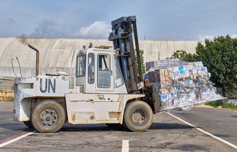 UNICEF staff and airport workers load trucks with aid from the European Civil Protection and Humanitarian Aid Operations (ECHO) for the Ebola outbreak caused by the Bundibugyo strain, at Bunia National Airport in Bunia, Ituri province, Democratic Republic of Congo, May 28, 2026. REUTERS/Gradel Muyisa Mumbere