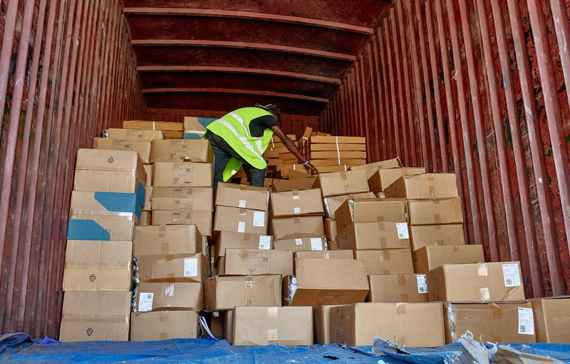UNICEF staff and airport workers load trucks with aid from the European Civil Protection and Humanitarian Aid Operations (ECHO) for the Ebola outbreak caused by the Bundibugyo strain, at Bunia National Airport in Bunia, Ituri province, Democratic Republic of Congo, May 28, 2026. REUTERS/Gradel Muyisa Mumbere