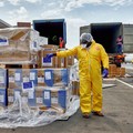UNICEF staff and airport workers load trucks with aid from the European Civil Protection and Humanitarian Aid Operations (ECHO) for the Ebola outbreak caused by the Bundibugyo strain, at Bunia National Airport in Bunia, Ituri province, Democratic Rep