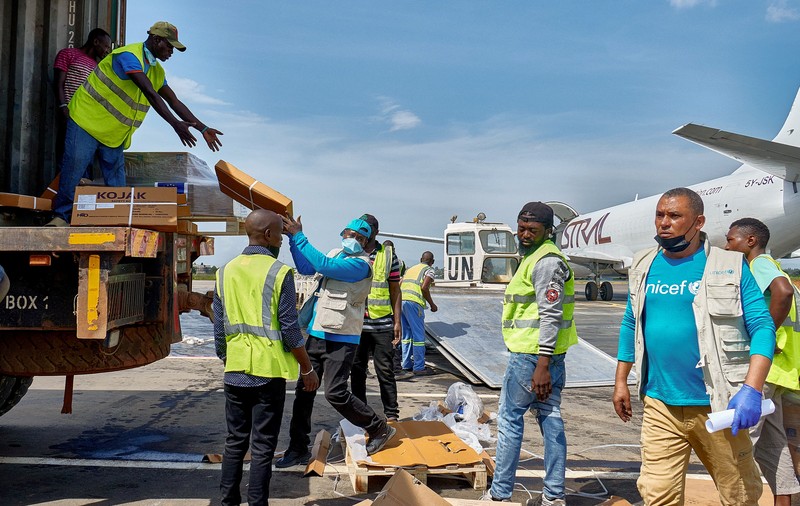 UNICEF staff and airport workers load trucks with aid from the European Civil Protection and Humanitarian Aid Operations (ECHO) for the Ebola outbreak caused by the Bundibugyo strain, at Bunia National Airport in Bunia, Ituri province, Democratic Republic of Congo, May 28, 2026. REUTERS/Gradel Muyisa Mumbere