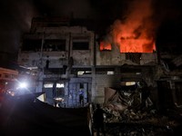 Smoke rises from a residential building following an Israeli strike, in Gaza City, May 27, 2026. REUTERS/Dawoud Abu Alkas