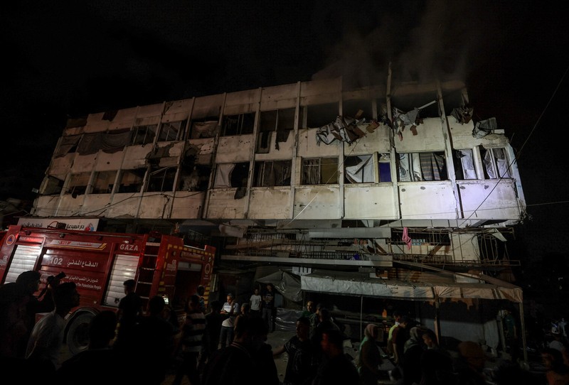 Smoke rises from a residential building following an Israeli strike, in Gaza City, May 27, 2026. REUTERS/Dawoud Abu Alkas