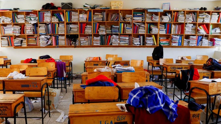 Students' personal effects and books are left abandoned inside a classroom following an overnight fire inside a dormitory at the Utumishi Girls' Academy Senior School in Gilgil, Nakuru county, Kenya May 28, 2026. REUTERS/Thomas Mukoya