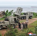 North Korean leader Kim Jong Un oversees test launches of a mix of tactical ballistic missiles, artillery rockets and precision cruise missiles, at an undisclosed location in North Korea, May 26, 2026, in this picture released May 27, 2026 by North K