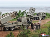 North Korean leader Kim Jong Un oversees test launches of a mix of tactical ballistic missiles, artillery rockets and precision cruise missiles, at an undisclosed location in North Korea, May 26, 2026, in this picture released May 27, 2026 by North K