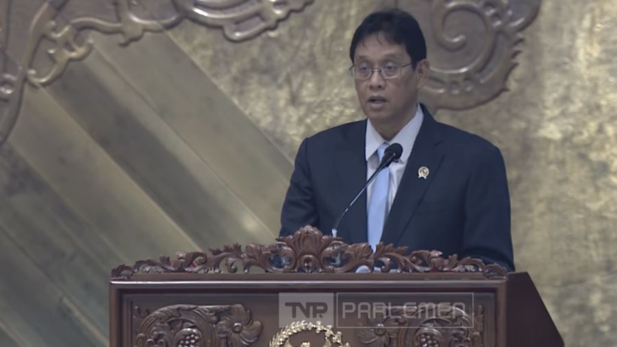 Menteri Keuangan (Menkeu), Purbaya Yudhi Sadewa saat menyampaikan laporan dalam Rapat Paripurna DPR RI ke-20 Masa Persidangan V Tahun Sidang 2025–2026 di Komplek Parlemen, Jakarta, Kamis (4/6/2026). (Tangkapan Layar Youtube/TVR Parlemen)