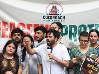 Abhijeet Dipke, head of the Cockroach Janta Party (CJP), speaks to supporters of the CJP during a sit-in protest demanding the resignation of Indian Education Minister Dharmendra Pradhan, in New Delhi, India, June 6, 2026. REUTERS/Adnan Abidi