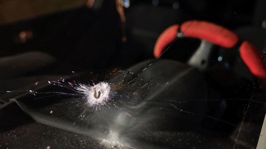 A bullet hole in the front window of a car of Palestinian father Fahed Abu Haykal after his seven-month-old baby was killed by Israeli forces, in Hebron in the Israeli-occupied West Bank, June 5, 2026. REUTERS/Mussa Qawasma