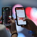 Layar menampilkan pergerakan Indeks Harga Saham Gabungan (IHSG) di gedung Bursa Efek Indonesia (BEI), Jakarta, Senin (8/6/2026). (CNBC Indonesia/Tri Susilo)