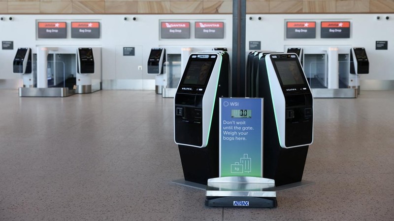Kios layanan mandiri untuk check-in dan penyerahan bagasi di Bandara Internasional Western Sydney, setelah Qantas Airways dan Jetstar mengumumkan akan meluncurkan layanan penumpang komersial dari bandara tersebut setelah pembukaannya pada 25 Oktober, di Luddenham, Western Sydney, Australia, 10 Juni 2026.