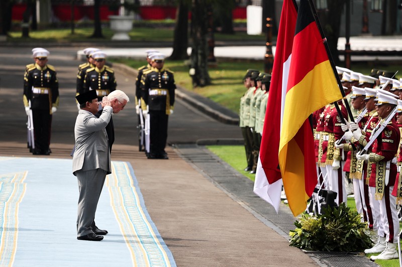 Indonesian President Prabowo Subianto and German President Frank-Walter Steinmeier walk during a welcoming ceremony upon their meeting at the Merdeka Palace in Jakarta, Indonesia, June 15, 2026. REUTERS/Willy Kurniawan