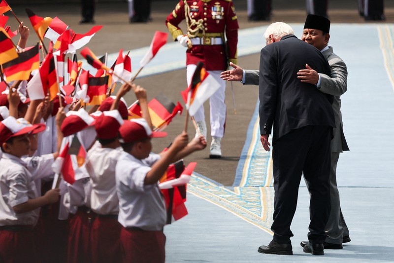Indonesian President Prabowo Subianto and German President Frank-Walter Steinmeier walk during a welcoming ceremony upon their meeting at the Merdeka Palace in Jakarta, Indonesia, June 15, 2026. REUTERS/Willy Kurniawan