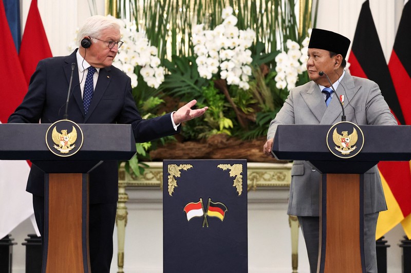 Indonesian President Prabowo Subianto and German President Frank-Walter Steinmeier walk during a welcoming ceremony upon their meeting at the Merdeka Palace in Jakarta, Indonesia, June 15, 2026. REUTERS/Willy Kurniawan