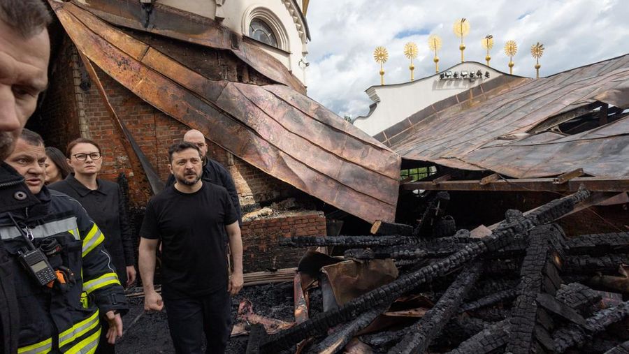 Ukraine's President Volodymyr Zelenskiy and Ukrainian Prime Minister Yulia Svyrydenko visit the Dormition Cathedral of the Kyiv Pechersk Lavra, which was hit during Russian missile and drone strikes, amid Russia's attack on Ukraine, in Kyiv, Ukraine