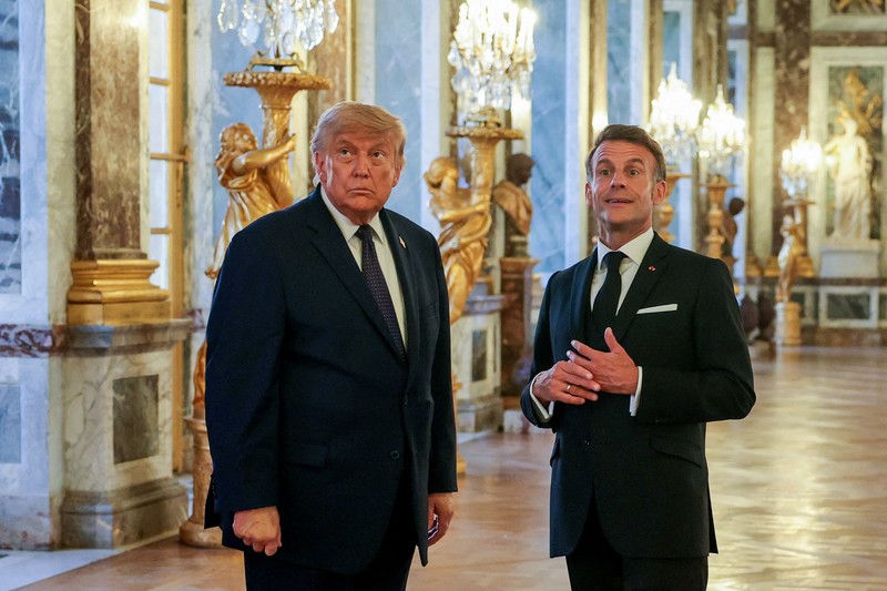 U.S. President Donald Trump receives a tour of Chateau de Versailles from President of France Emmanuel Macron and his wife Brigitte Macron ahead of a dinner, France, June 17, 2026. Anna Moneymaker/Pool via REUTERS
