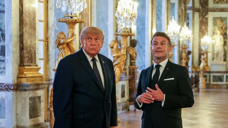 U.S. President Donald Trump receives a tour of Chateau de Versailles from President of France Emmanuel Macron ahead of a dinner, France, June 17, 2026. Anna Moneymaker/Pool via REUTERS