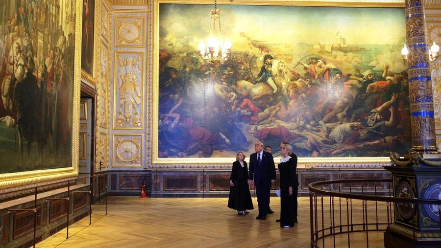U.S. President Donald Trump receives a tour of Chateau de Versailles from President of France Emmanuel Macron and his wife Brigitte Macron ahead of a dinner, France, June 17, 2026. Anna Moneymaker/Pool via REUTERS