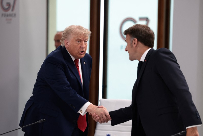 U.S. President Donald Trump attends a working session with G7 leaders and outreach partners on promoting economic growth during the G7 Summit in Evian-les-Bains, France, June 17, 2026. REUTERS/Evelyn Hockstein