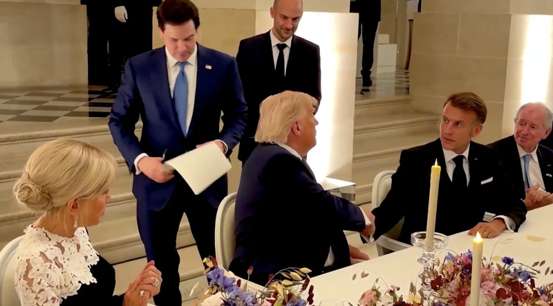 U.S. President Donald Trump receives a tour of Chateau de Versailles from President of France Emmanuel Macron and his wife Brigitte Macron ahead of a dinner, France, June 17, 2026. Anna Moneymaker/Pool via REUTERS