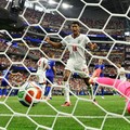 Soccer Football - FIFA World Cup 2026 - Group L - England v Croatia - Dallas Stadium, Arlington, Texas, U.S. - June 17, 2026 England's Harry Kane scores their second goal past Croatia's Dominik Livakovic as England's Jude Bellingham celebrates REUTER