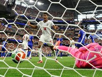 Soccer Football - FIFA World Cup 2026 - Group L - England v Croatia - Dallas Stadium, Arlington, Texas, U.S. - June 17, 2026 England's Harry Kane scores their second goal past Croatia's Dominik Livakovic as England's Jude Bellingham celebrates REUTER