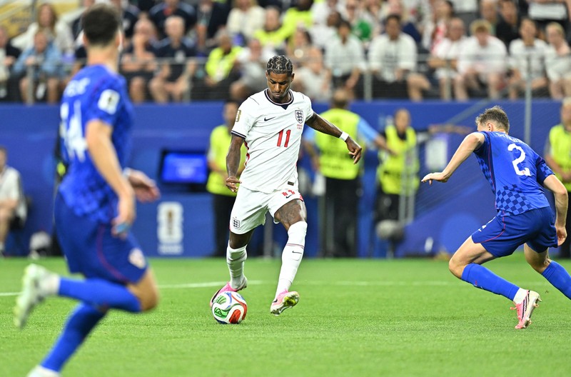 Soccer Football - FIFA World Cup 2026 - Group L - England v Croatia - Dallas Stadium, Arlington, Texas, U.S. - June 17, 2026 England's Harry Kane scores their second goal past Croatia's Dominik Livakovic REUTERS/Hannah Mckay     TPX IMAGES OF THE DAY