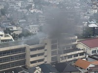Smoke rises from a primary school after a fire broke out in Kita city, Tokyo, Japan, June 19, 2026, in this screengrab obtained from a social media video. @takanyo VIA X/via REUTERS  THIS IMAGE HAS BEEN SUPPLIED BY A THIRD PARTY. MANDATORY CREDIT. NO