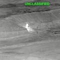 Rekaman drone menunjukkan serangan terhadap Iran yang menargetkan berbagai lokasi sebagai tanggapan atas agresi Iran yang berkelanjutan terhadap pelayaran komersial, di lokasi yang tidak diketahui dari gambar yang dirilis pada Sabtu (27/6/2026). (via