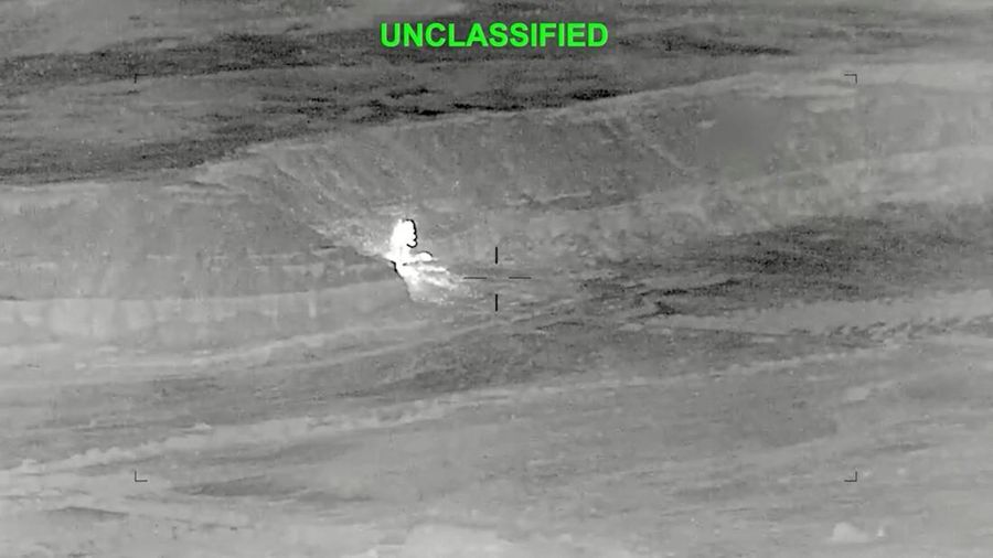 Rekaman drone menunjukkan serangan terhadap Iran yang menargetkan berbagai lokasi sebagai tanggapan atas agresi Iran yang berkelanjutan terhadap pelayaran komersial, di lokasi yang tidak diketahui dari gambar yang dirilis pada Sabtu (27/6/2026). (via REUTERS/U.S. Central Command)