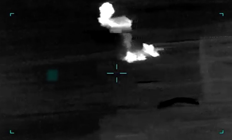 Rekaman drone menunjukkan serangan terhadap Iran yang menargetkan berbagai lokasi sebagai tanggapan atas agresi Iran yang berkelanjutan terhadap pelayaran komersial, di lokasi yang tidak diketahui dari gambar yang dirilis pada Sabtu (27/6/2026). (Tangkapan Layar Video/REUTERS)