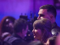 FILE PHOTO: Travis Kelce and Taylor Swift attend the 2026 iHeartRadio Music Awards at the Dolby Theatre in Los Angeles, California, U.S., March 26, 2026. REUTERS/Mario Anzuoni/File Photo