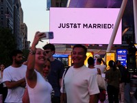 New York Police Department officers stand outside Madison Square Garden, the venue for the reported wedding celebrations of singer Taylor Swift and National Football League (NFL) player Travis Kelce, in New York, U.S., July 3, 2026.  REUTERS/Bing Gua