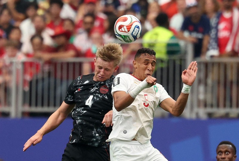 Soccer Football - FIFA World Cup 2026 - Round of 16 - Canada v Morocco - Houston Stadium, Houston, Texas, U.S. - July 4, 2026 Morocco's Achraf Hakimi, Brahim Diaz and Neil El Aynaoui celebrate after the match REUTERS/Hannah Mckay
