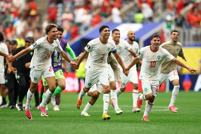 Soccer Football - FIFA World Cup 2026 - Round of 16 - Canada v Morocco - Houston Stadium, Houston, Texas, U.S. - July 4, 2026 Morocco's Achraf Hakimi, Brahim Diaz and Neil El Aynaoui celebrate after the match REUTERS/Hannah Mckay