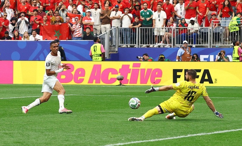 Soccer Football - FIFA World Cup 2026 - Round of 16 - Canada v Morocco - Houston Stadium, Houston, Texas, U.S. - July 4, 2026 Morocco's Achraf Hakimi, Brahim Diaz and Neil El Aynaoui celebrate after the match REUTERS/Hannah Mckay