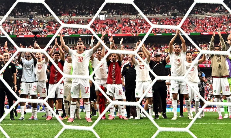 Soccer Football - FIFA World Cup 2026 - Round of 16 - Canada v Morocco - Houston Stadium, Houston, Texas, U.S. - July 4, 2026 Morocco's Achraf Hakimi, Brahim Diaz and Neil El Aynaoui celebrate after the match REUTERS/Hannah Mckay