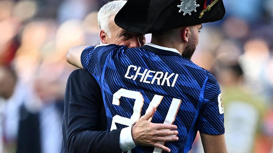Soccer Football - FIFA World Cup 2026 - Round of 16 - Paraguay v France - Philadelphia Stadium, Philadelphia, Pennsylvania, U.S. - July 4, 2026 France coach Didier Deschamps and Rayan Cherki celebrate after the match as France qualify for the quarter