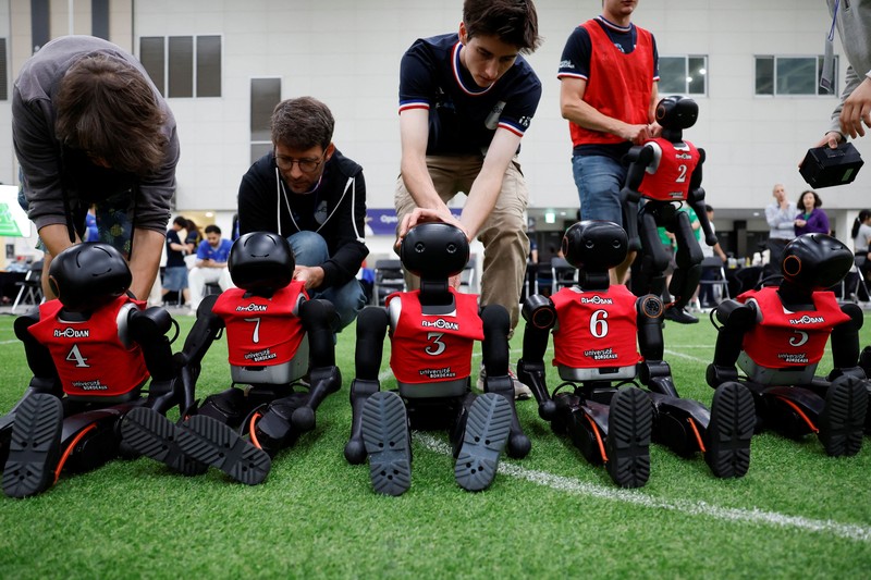 Humanoid robots compete during the Large Division final match between Team Hephaestus of Tsinghua University and Team Mountain and Sea of China Agricultural University at the RoboCup 2026 international robot competition in Incheon, South Korea, July 5, 2026. REUTERS/Kim Soo-hyeon
