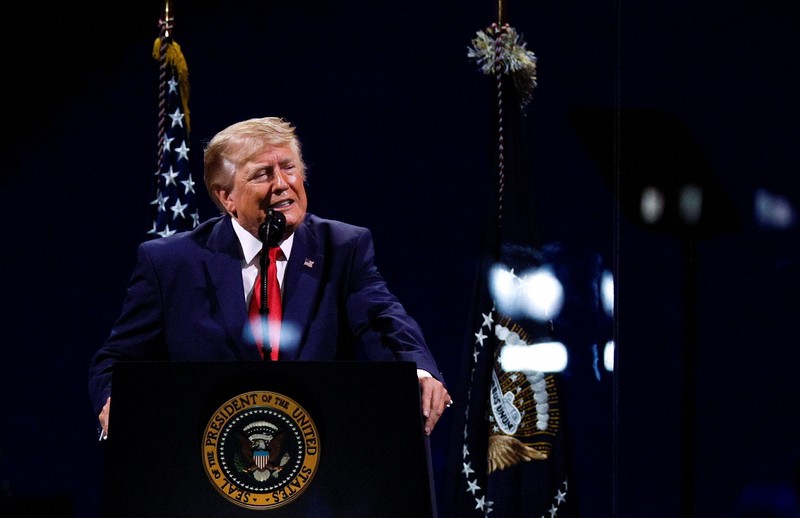 U.S. President Donald Trump watches fireworks explode during the Freedom 250's Salute to America as the United States celebrates its 250th anniversary on Independence Day, attempting the largest firework display in history with 850,000 fireworks in Washington, D.C., U.S., July 5, 2026. REUTERS/Jonathan Ernst