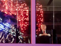 U.S. President Donald Trump watches fireworks explode during the Freedom 250's Salute to America as the United States celebrates its 250th anniversary on Independence Day, attempting the largest firework display in history with 850,000 fireworks in W